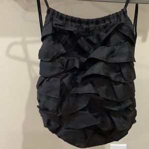 Backpack ruffle light weight! Super cute ! Zip pocket on the back outside!